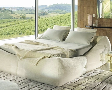 Letto imbottito Mon-Nid con box contenitore di Cassina