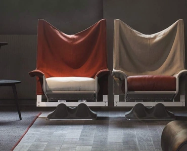 Poltrona di design AEO in tessuto con seduta in pelle di Cassina