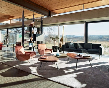 Poltrona di design in tessuto con piedi in metallo Lady di Cassina