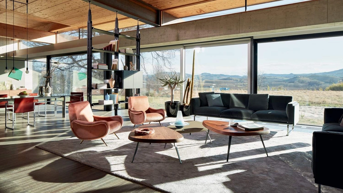 Poltrona di design in tessuto con piedi in metallo Lady di Cassina
