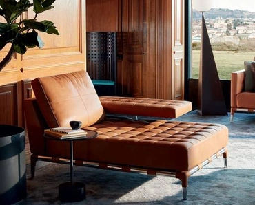 Poltrona elegante e confortevole Privé in pelle trapuntata di Cassina
