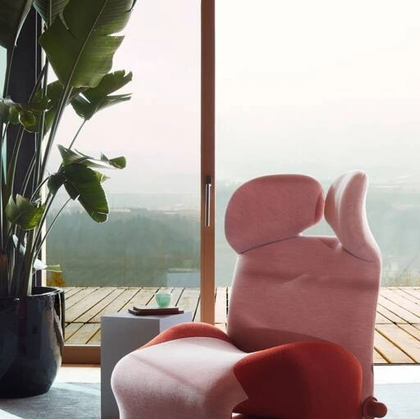 Poltrona di design Wink in tessuto imbottito di Cassina