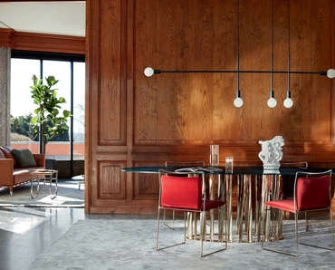 Tavolo Boboli con piano in marmo e base in alluminio verniciato di Cassina