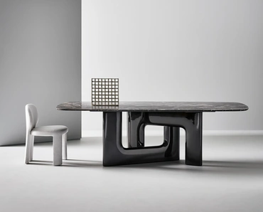 Tavolo di design Liaison con top in marmo e base in poliuretano di Bonaldo