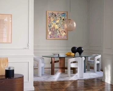 Tavolo ovale Sengu con top in gres porcellanato e base in legno massello di Cassina