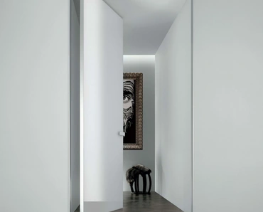 Porta per interni in vetro laccato lucido Aura complanare con chiusura magnetica di Rimadesio